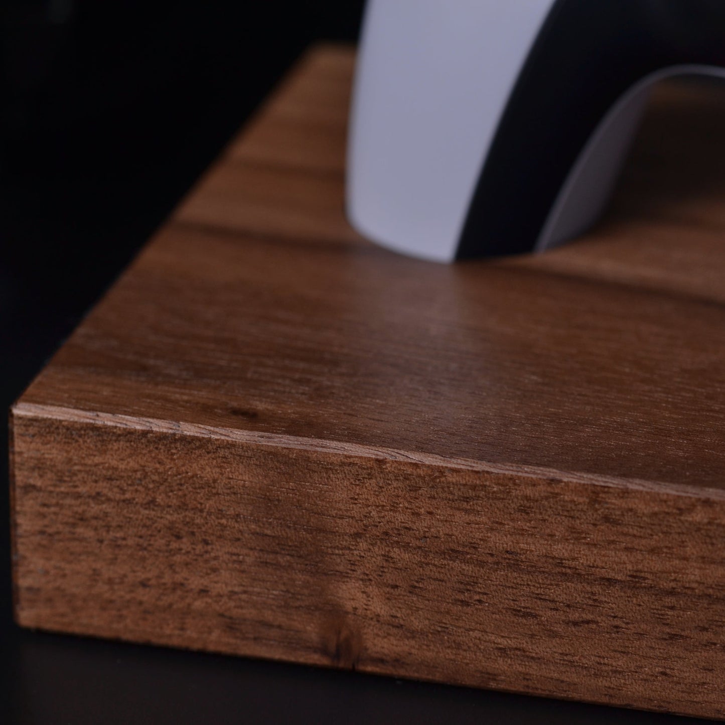 Close up detail of wooden stand for Playstation 5 Dualsense Controller